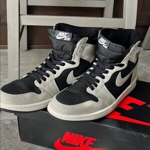 Men’s size 9 gently used Nike Air Jordan’s Black and Gray high tops